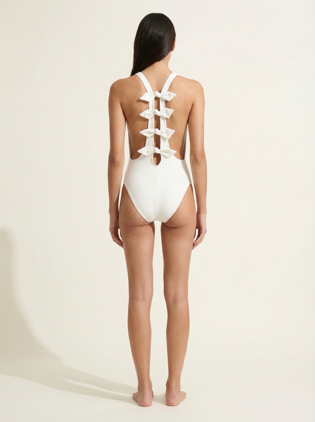 The Arabella — Bow-Spine Open Back One-Piece - 08-model-back-view-approved